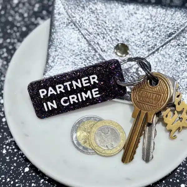 porte clés à paillettes partner in crime plus de love